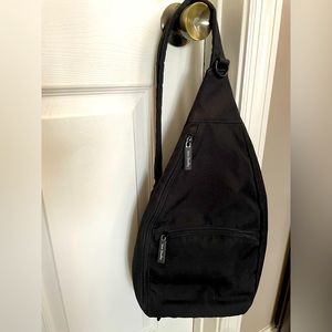 Vera Bradley black canvas sling backpack used once